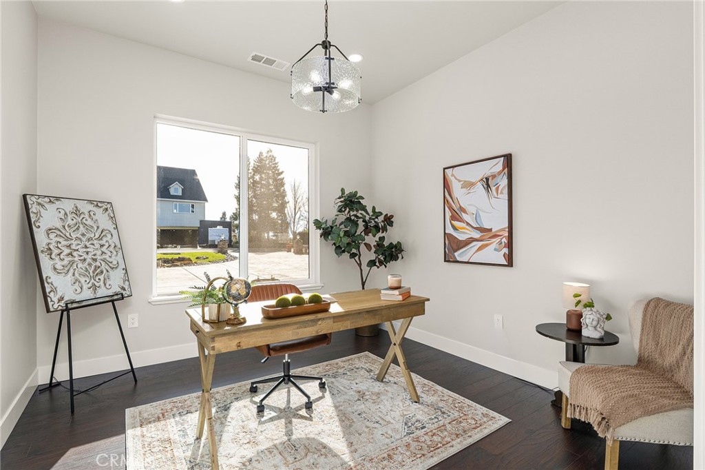163 Valley Ridge Drive Paradise, CA 95969 - Photo 24 of 69 a living room with furniture and a chandelier