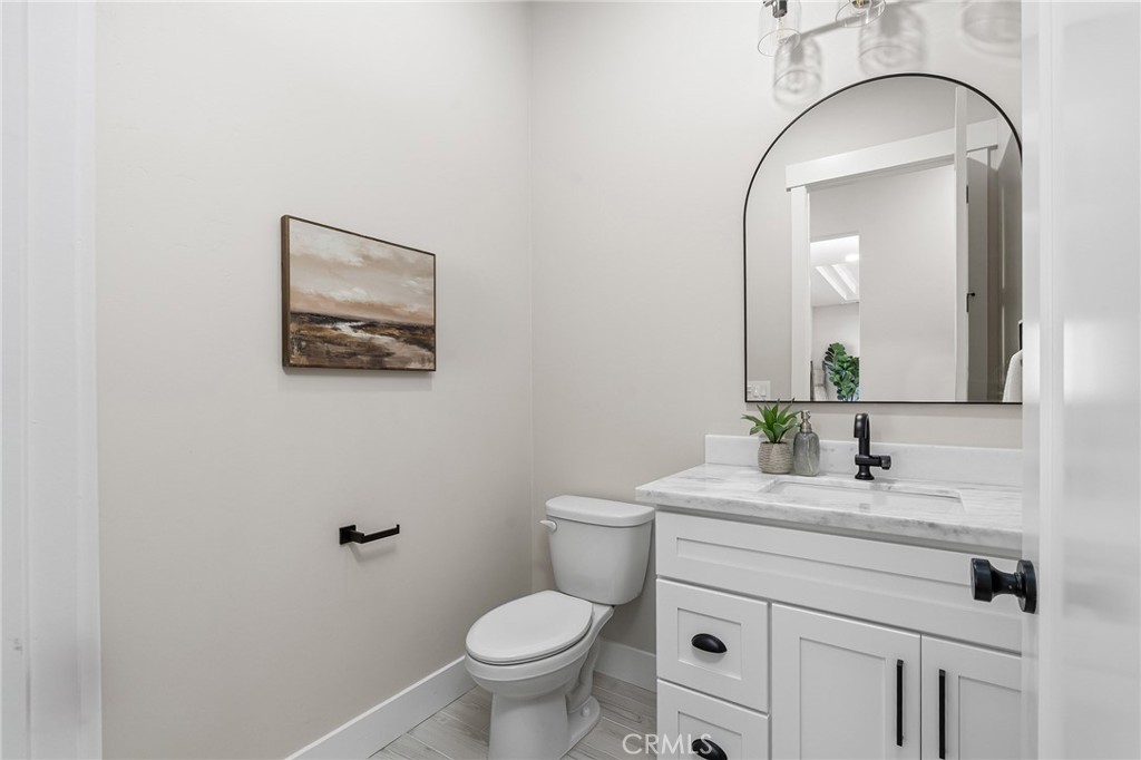 163 Valley Ridge Drive Paradise, CA 95969 - Photo 25 of 69 a bathroom with a toilet sink and mirror