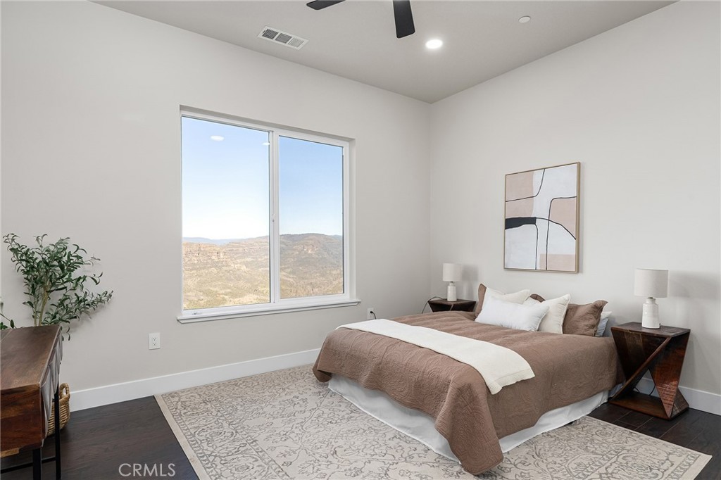 163 Valley Ridge Drive Paradise, CA 95969 - Photo 38 of 69 a bedroom with a bed and a window