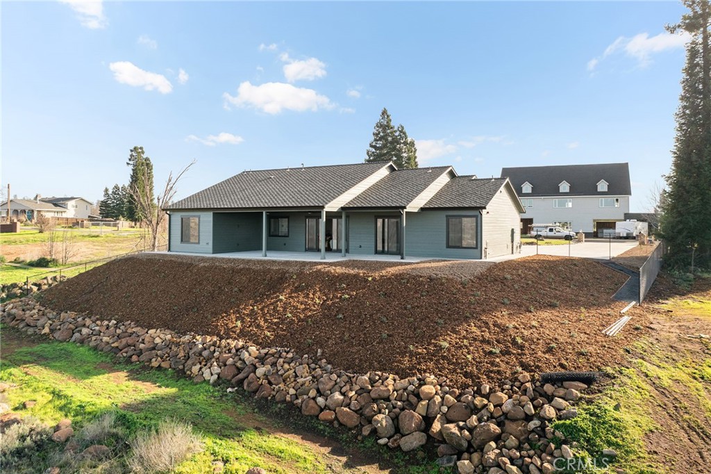 163 Valley Ridge Drive Paradise, CA 95969 - Photo 63 of 69 a front view of a house with a yard