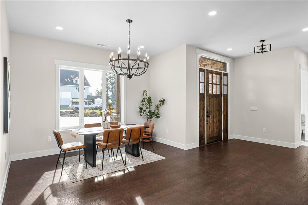 163 Valley Ridge Drive Paradise, CA 95969 - Photo 9 of 69 a view of a dining room with furniture window and wooden floor