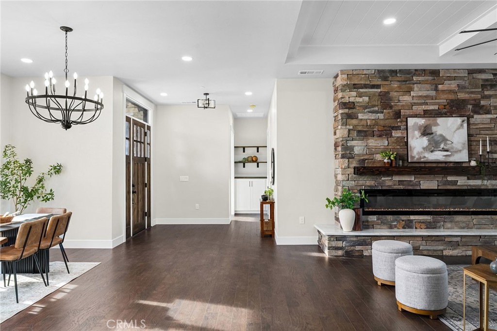 163 Valley Ridge Drive Paradise, CA 95969 - Photo 10 of 69 a view of a hallway with wooden floor and a potted plant