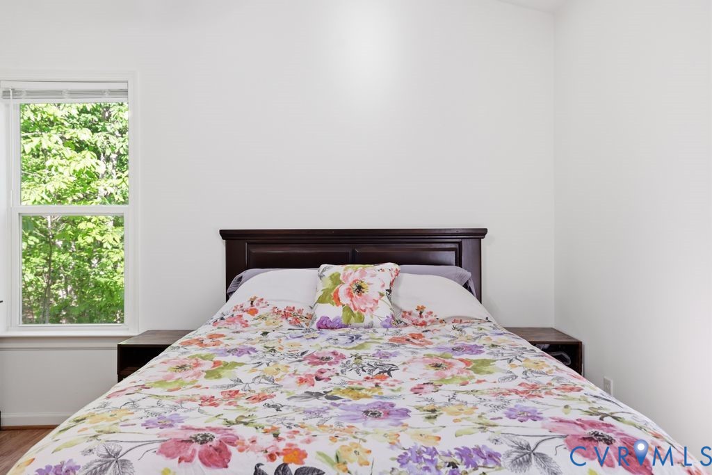 5307 St Pauls Church Road Goochland, VA 23063 - Photo 27 of 44 a large bed sitting in a bedroom next to a window