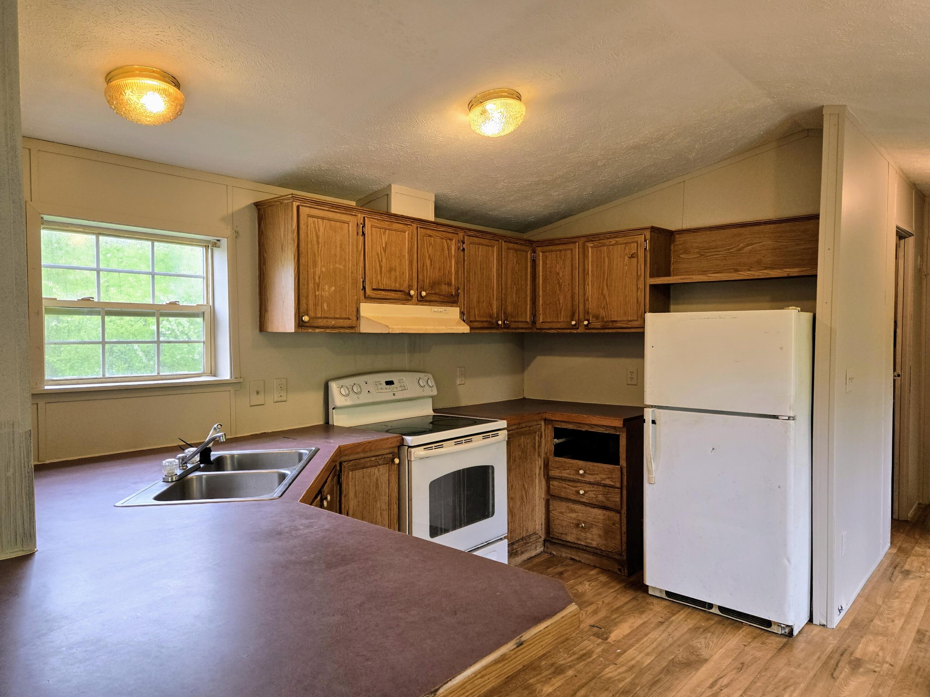 613 Norton Hill Road New Vineyard, ME 04956 - Photo 8 of 37 20250523_105642~2