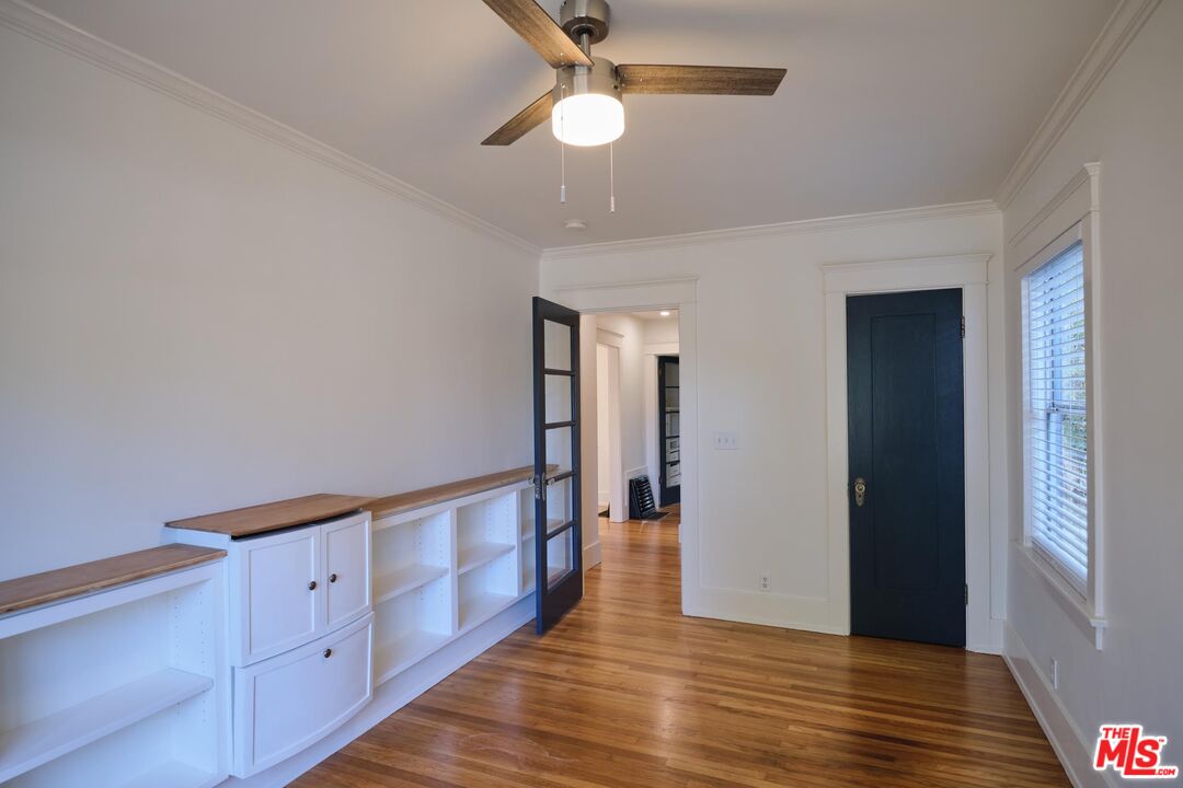 9030 Carson Street Culver City, CA 90232 - Photo 12 of 19 a view of a hallway with wooden floor