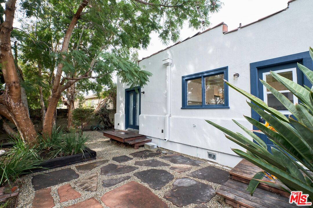 9030 Carson Street Culver City, CA 90232 - Photo 14 of 19 a view of a house with a yard