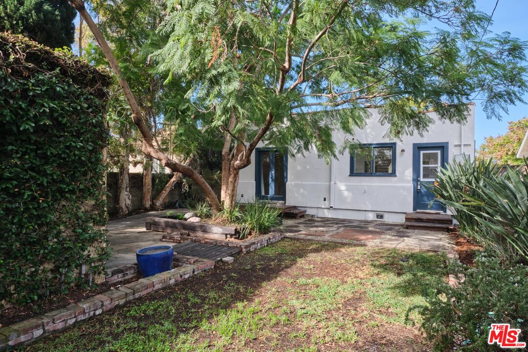 9030 Carson Street Culver City, CA 90232 - Photo 15 of 19 a view of a house with backyard and trees