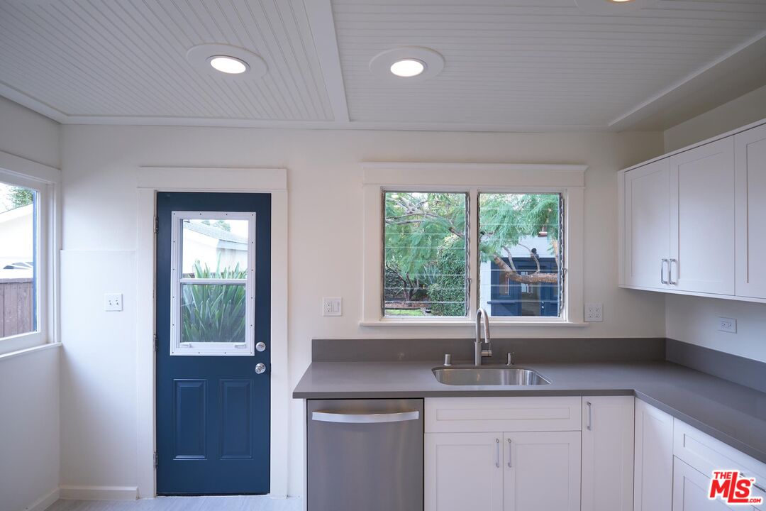 9030 Carson Street Culver City, CA 90232 - Photo 5 of 19 a kitchen with a sink and window