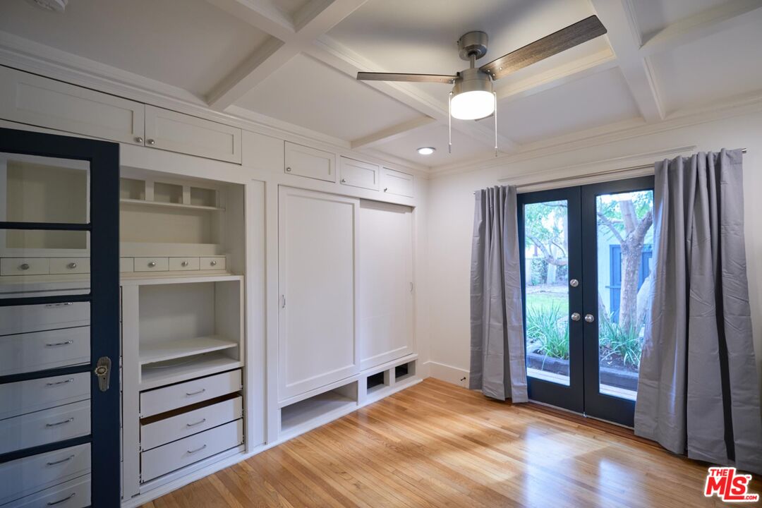 9030 Carson Street Culver City, CA 90232 - Photo 7 of 19 wooden floor in an empty room with a window