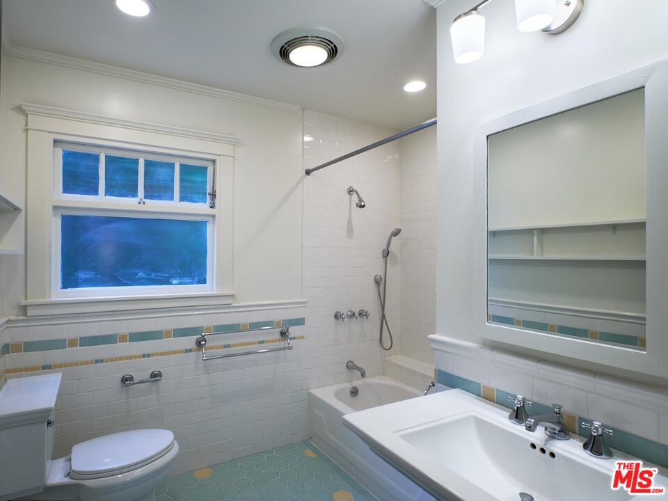 9030 Carson Street Culver City, CA 90232 - Photo 9 of 19 a bathroom with a sink toilet and shower