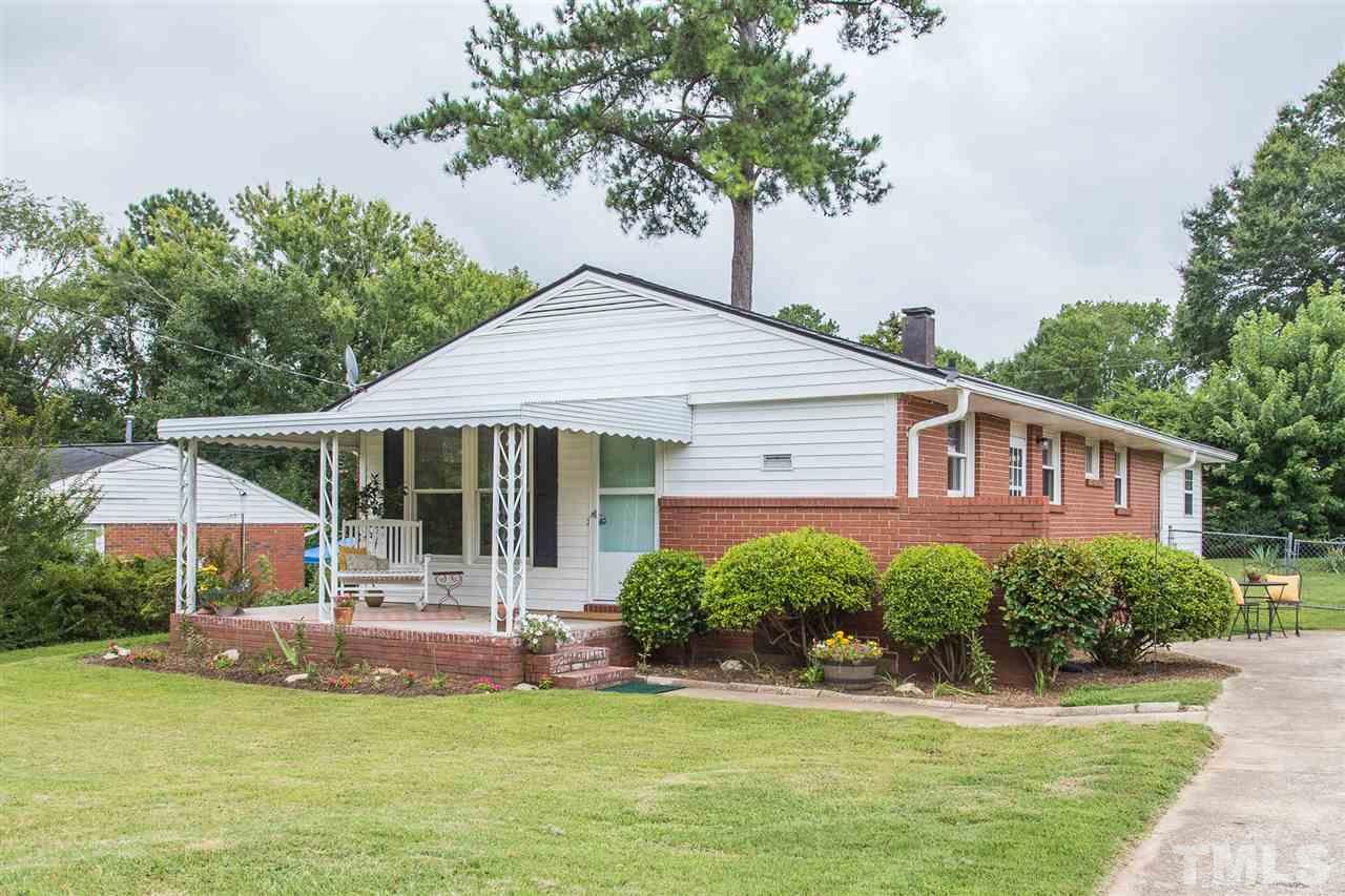 744 Fitzgerald Drive Raleigh, NC 27610 - Photo 2 of 28 a front view of a house with garden