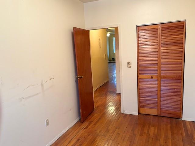 644 New York Avenue, Unit 2 Brooklyn, NY 11203 - Photo 6 of 10 a view of hallway with wooden floor