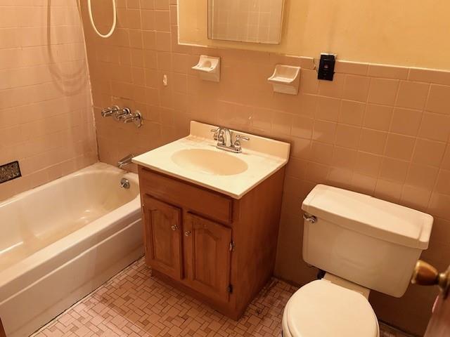 644 New York Avenue, Unit 2 Brooklyn, NY 11203 - Photo 10 of 10 a bathroom with a sink a toilet and shower