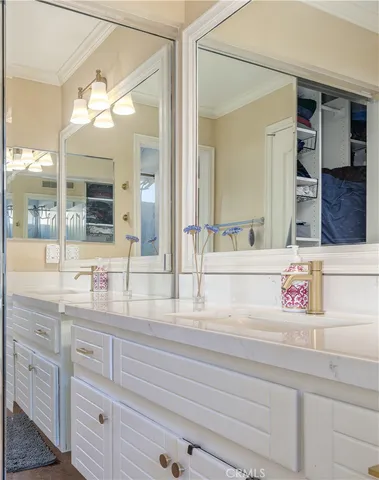 a bedroom with a bed and a fireplace