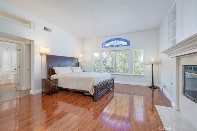 a bathroom with a sink vanity and a mirror
