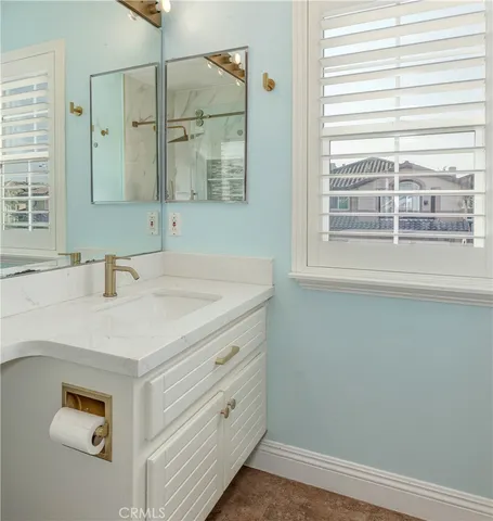 a living room with furniture rug and window