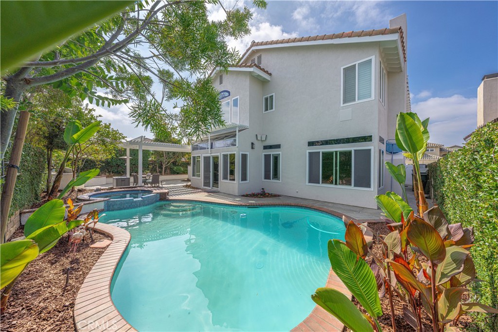 9574 Tivoli Circle Cypress, CA 90630 - Photo 54 of 68 a view of a house with swimming pool