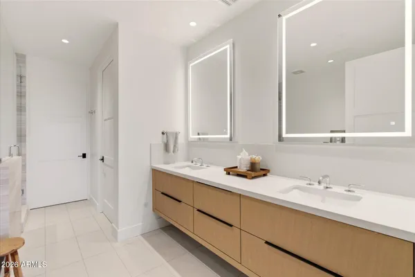 a bathroom with a bathtub and shower