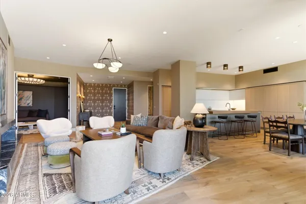 a living room with furniture and a rug
