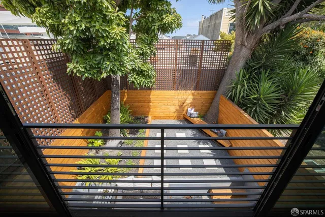 a view of outdoor space with wooden stairs