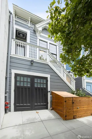 a view of a house with a large window