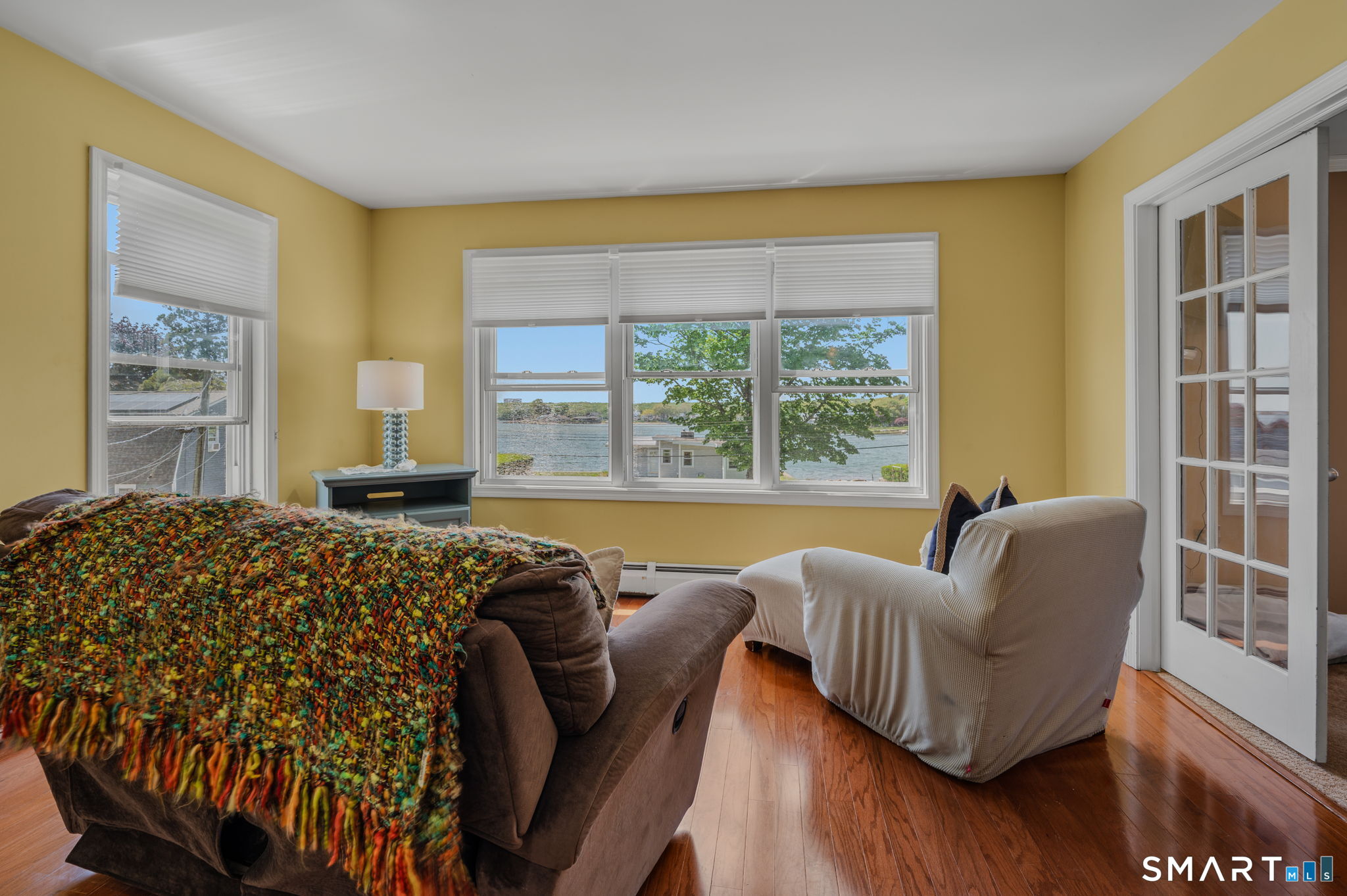 212 R Shore Road Waterford, CT 06385 - Photo 24 of 28 a living room with furniture and a large window