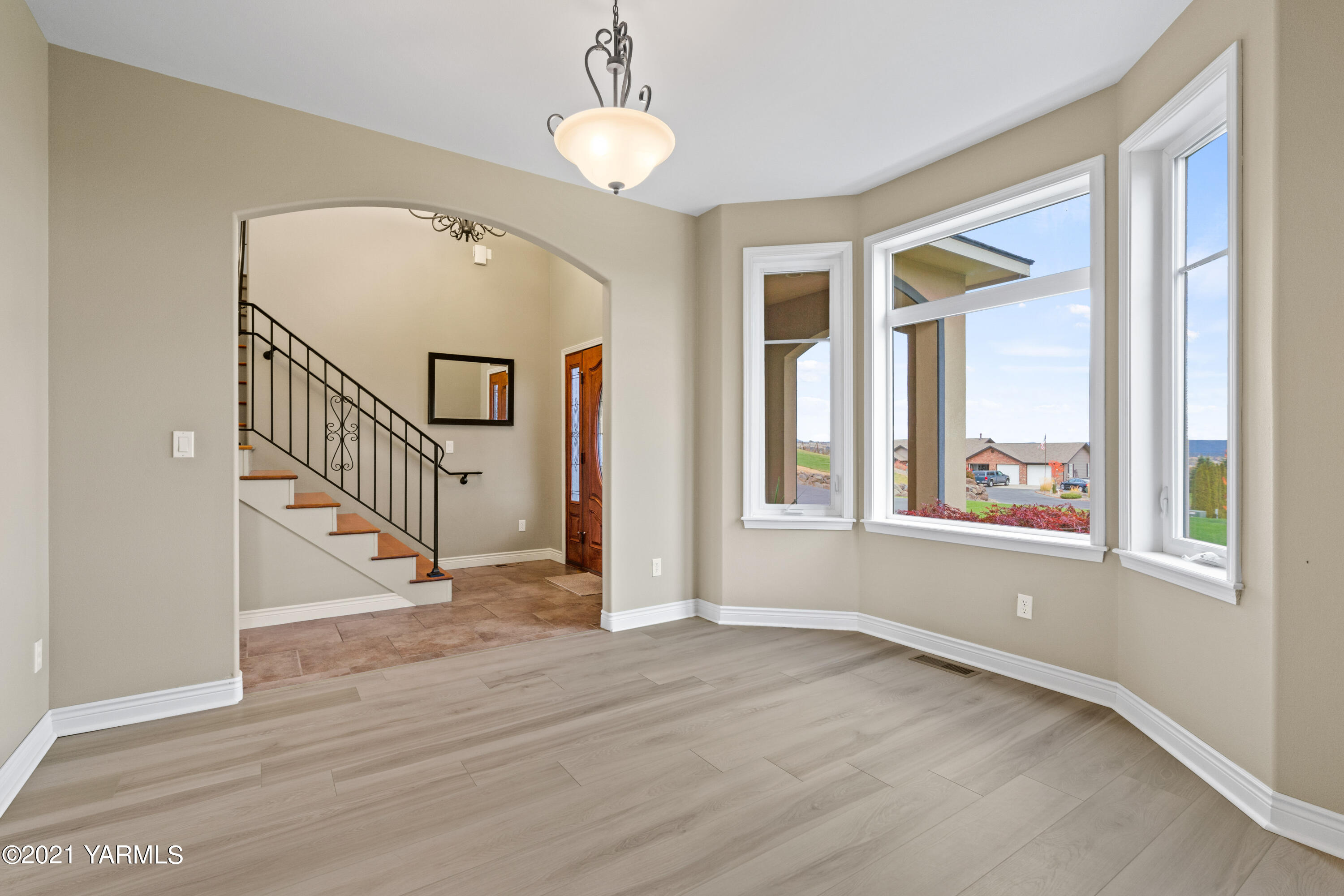 10807 Zier Road Yakima, WA 98908 - Photo 12 of 44 wooden floor in an empty room with a window