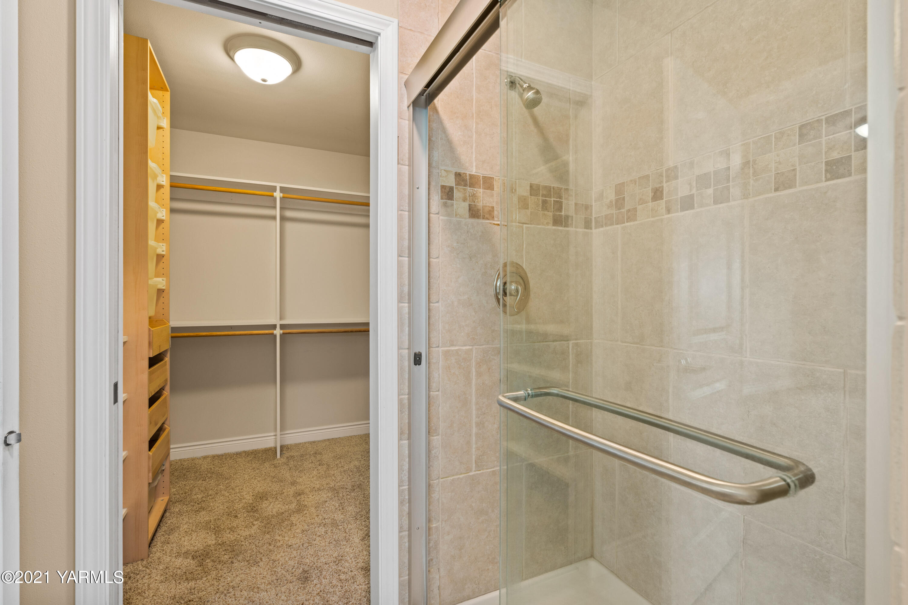 10807 Zier Road Yakima, WA 98908 - Photo 33 of 44 a bathroom with a glass shower door