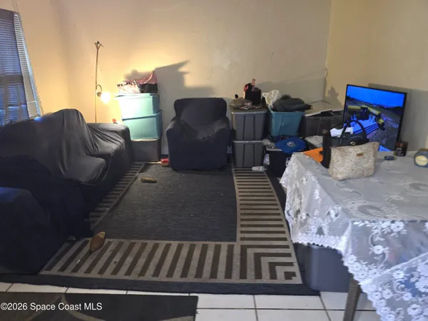 a living room with furniture and a couch