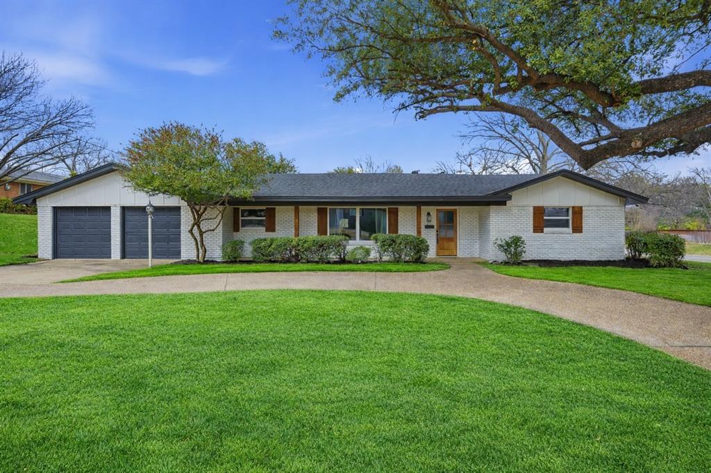 6400 Inca Road Fort Worth, TX 76116 - Photo 1 of 1 a front view of a house with a garden