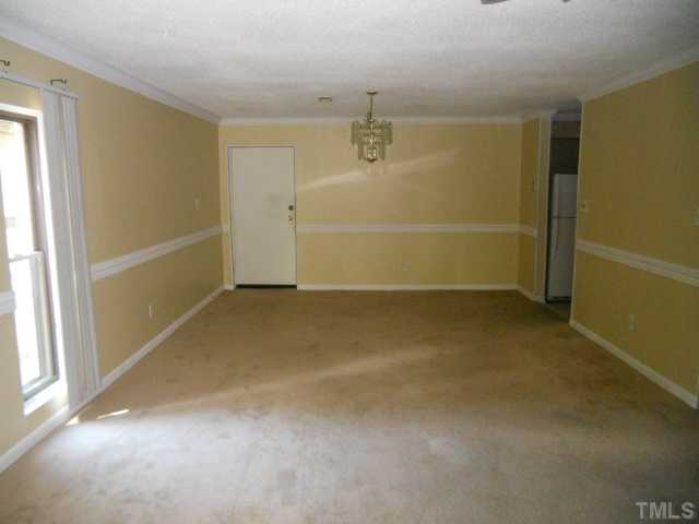 654 Pine Ridge Place Raleigh, NC 27609 - Photo 3 of 7 a view of a room with an empty space