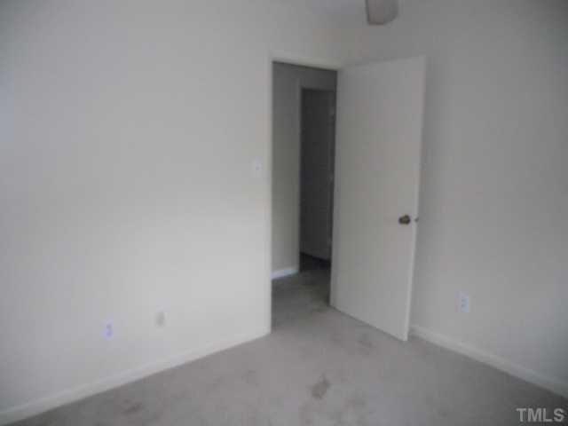 654 Pine Ridge Place Raleigh, NC 27609 - Photo 6 of 7 a view of an empty room