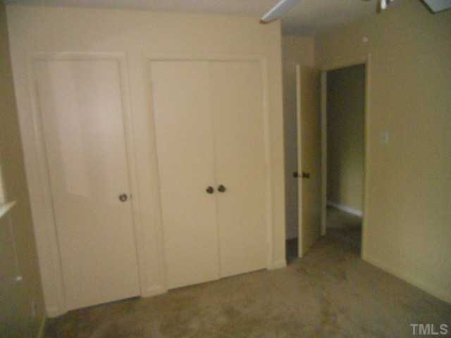 654 Pine Ridge Place Raleigh, NC 27609 - Photo 7 of 7 a view of an empty room
