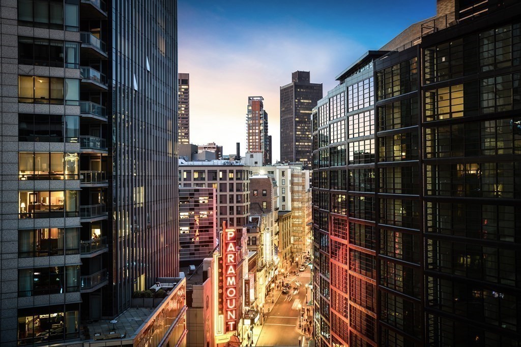 580 Washington Street, Unit 1207 Boston, MA 02111 - Photo 16 of 16 a city view with tall buildings