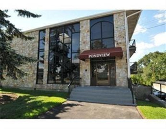 40 Cochituate Road, Unit 45 Framingham, MA 01701 - Photo 2 of 9 a front view of a house with garden
