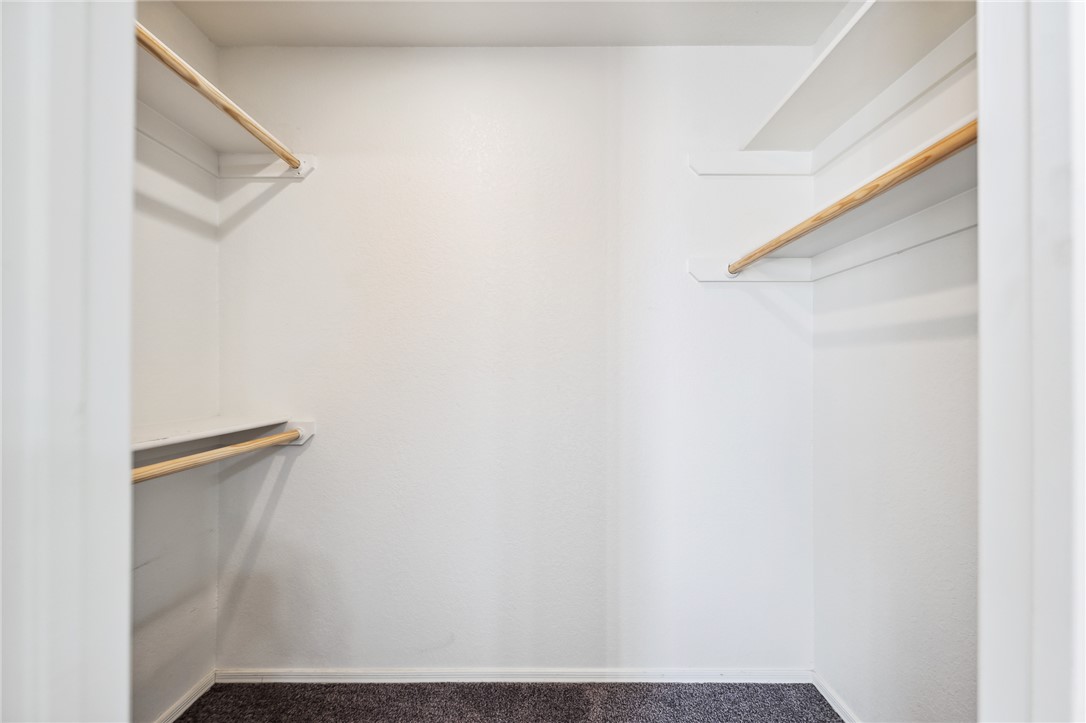 2524 South Ridge Avenue Bullhead City, AZ 86429 - Photo 30 of 64 Spacious closet featuring carpet floors