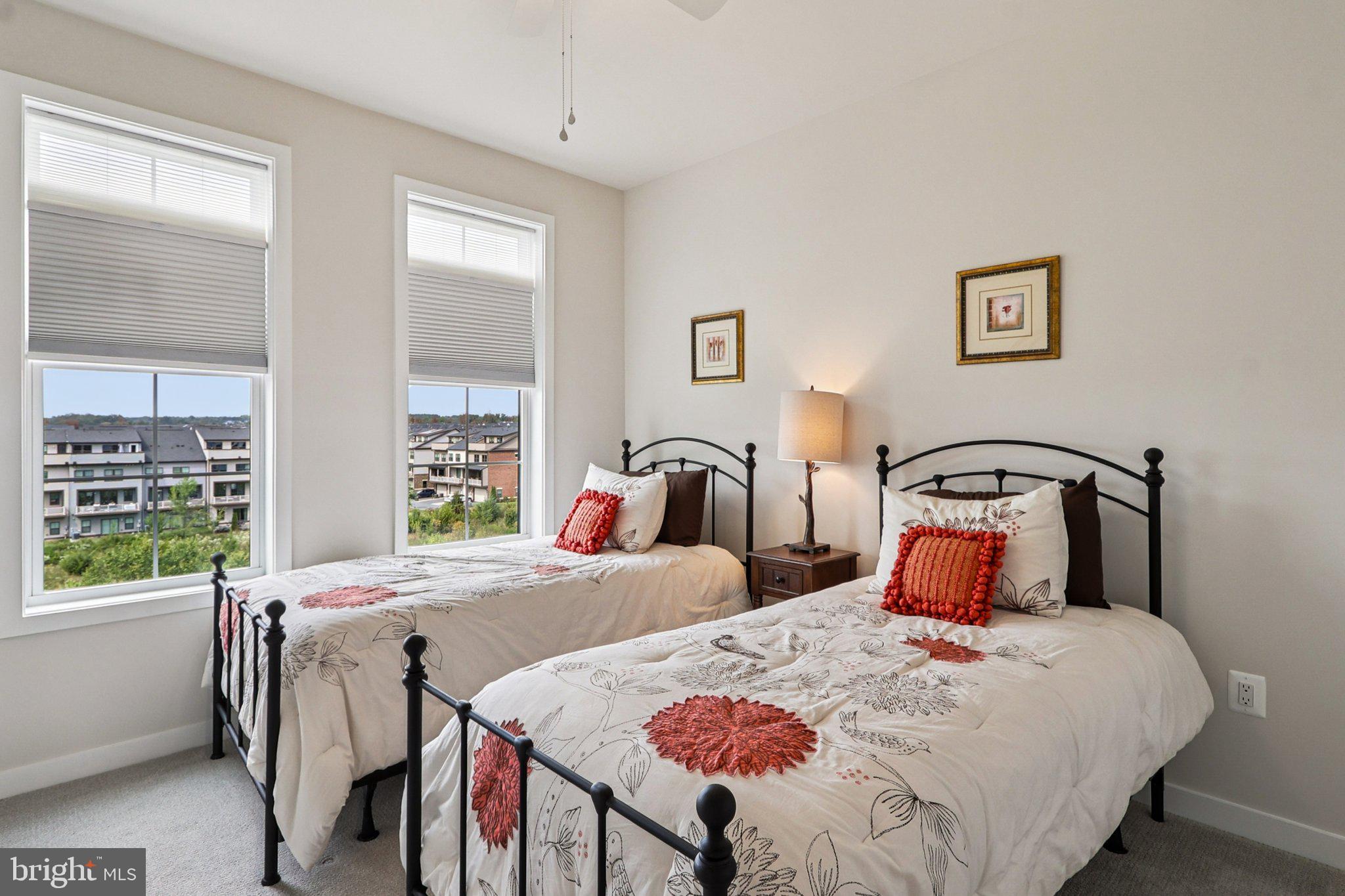 22381 Roanoke Rise Terrace Ashburn, VA 20148 - Photo 43 of 69 a bedroom with two beds and a window
