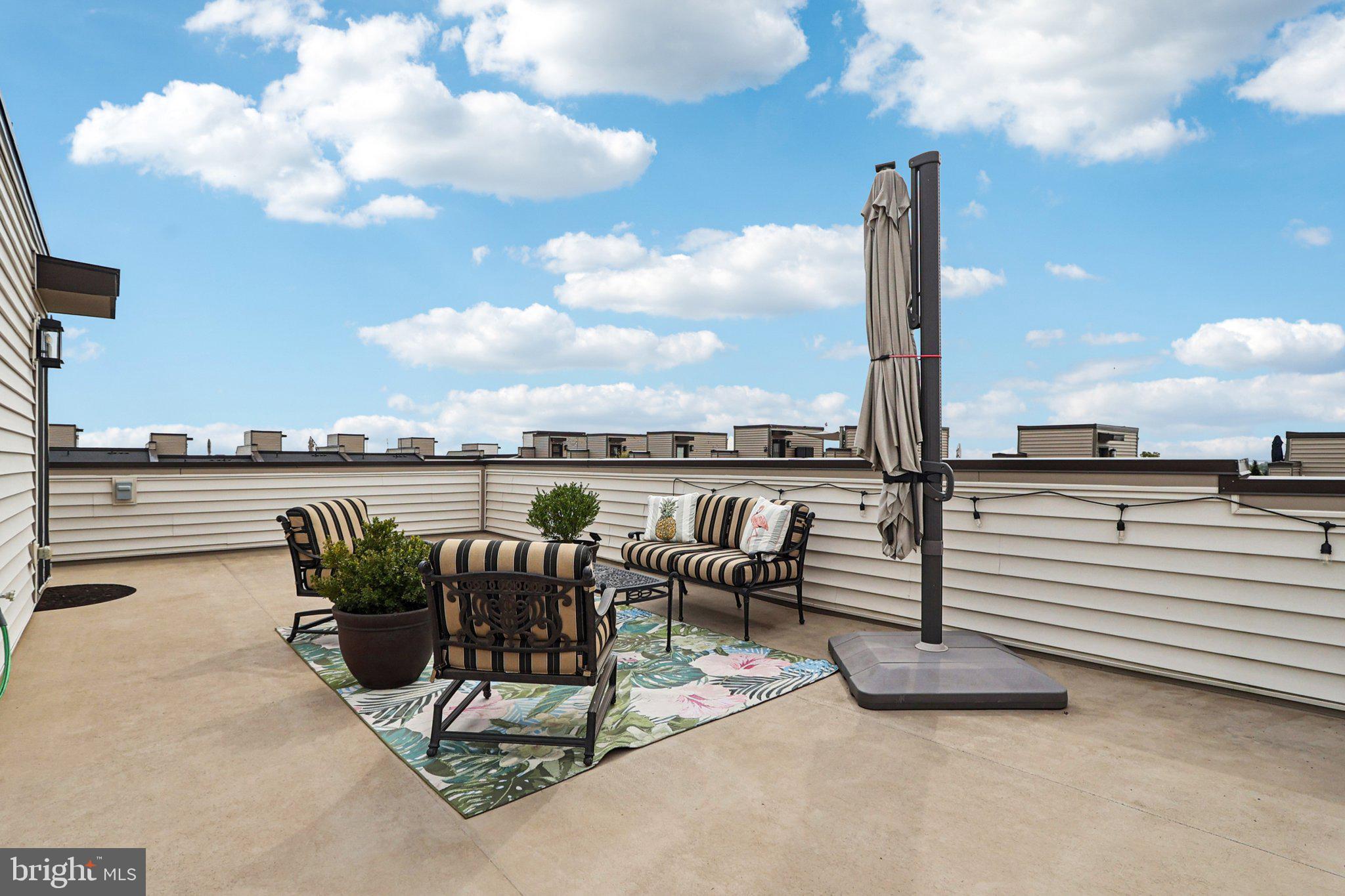 22381 Roanoke Rise Terrace Ashburn, VA 20148 - Photo 46 of 69 a view of a terrace with chairs