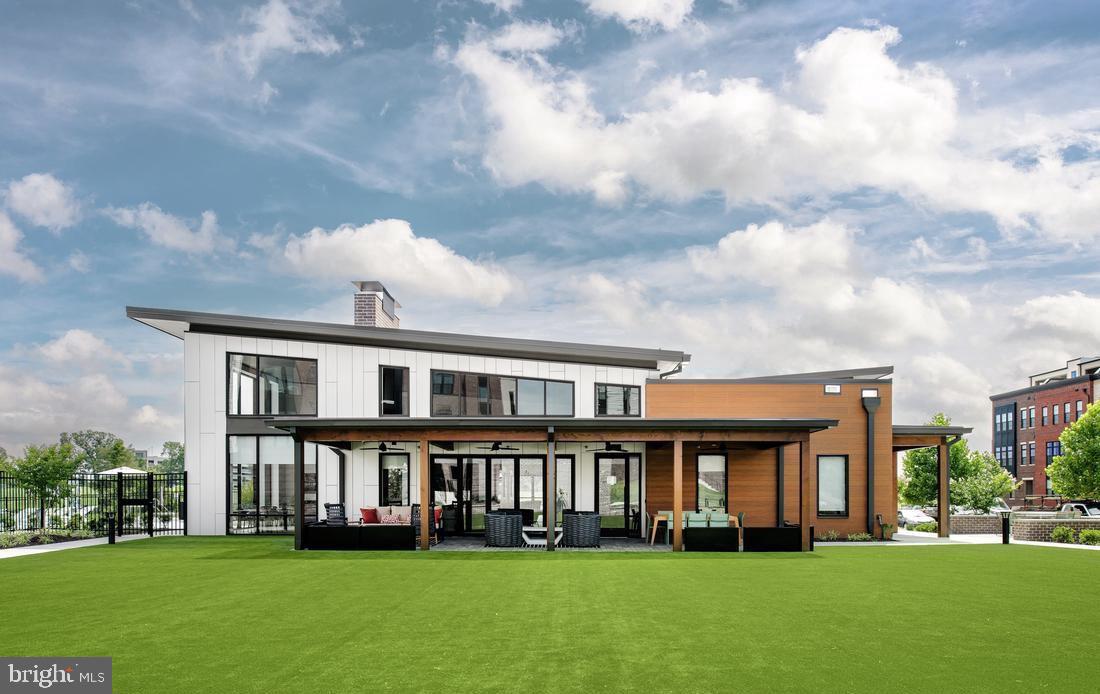 22381 Roanoke Rise Terrace Ashburn, VA 20148 - Photo 59 of 69 a front view of building with yard and green space