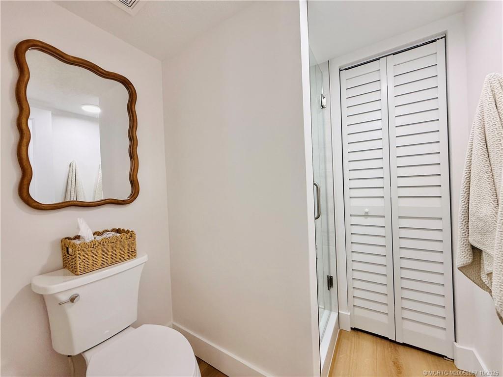 7370 South Ocean Drive, Unit 312 Jensen Beach, FL 34957 - Photo 44 of 67 a bathroom with a toilet and a sink