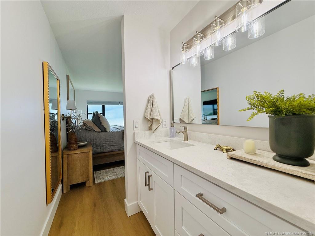 7370 South Ocean Drive, Unit 312 Jensen Beach, FL 34957 - Photo 47 of 67 a en suite bathroom with a sink double vanity