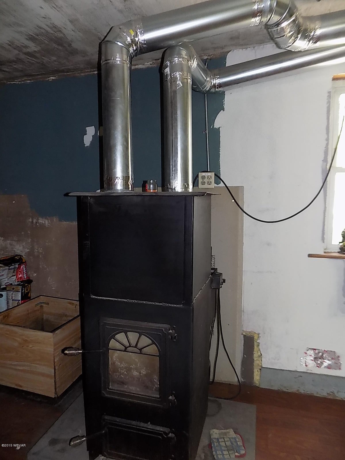 138 Slacks Run Road Trout Run, PA 17771 - Photo 17 of 23 Coal Stoker Stove