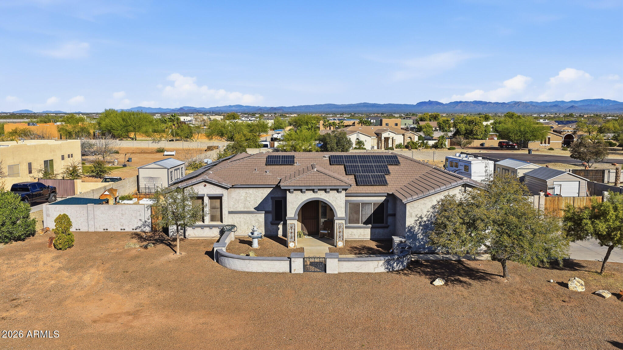23024 West Sierra Ridge Way Wittmann, AZ 85361 - Photo 54 of 99 a view of a city with lawn chairs