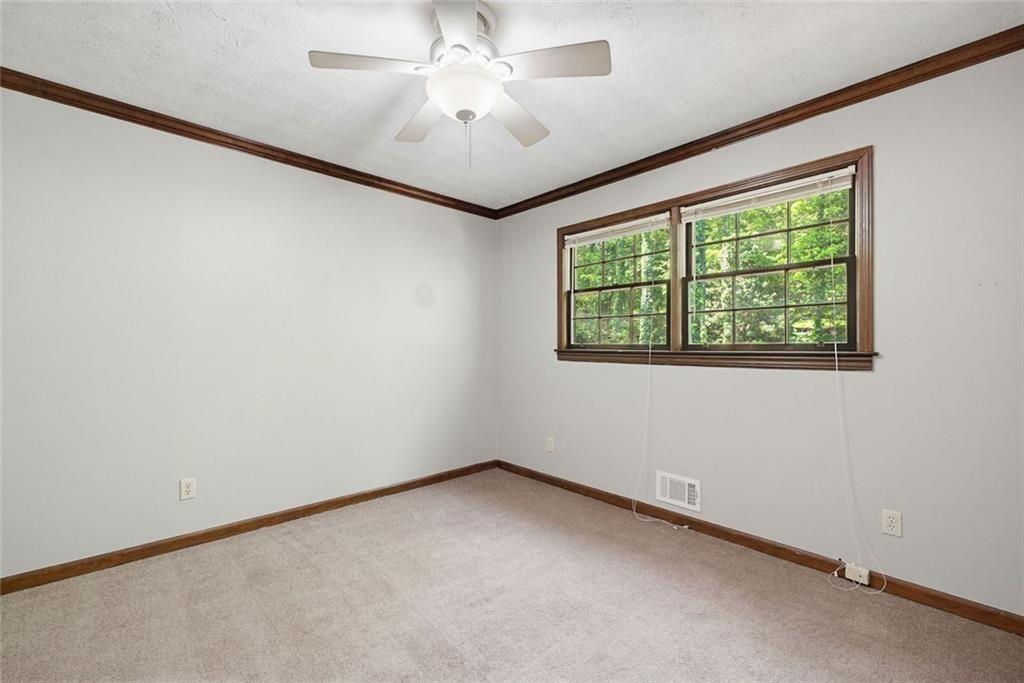 2845 Wood Forest Road Marietta, GA 30066 - Photo 16 of 26 an empty room with a window