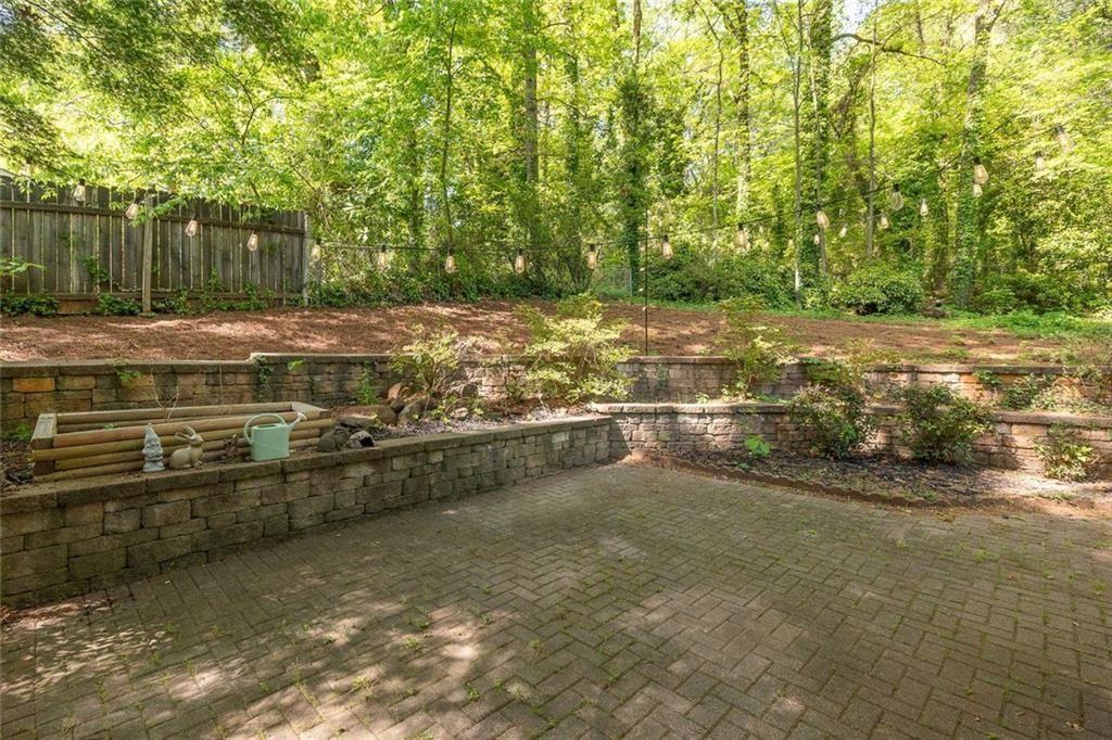2845 Wood Forest Road Marietta, GA 30066 - Photo 22 of 26 a view of swimming pool with a yard