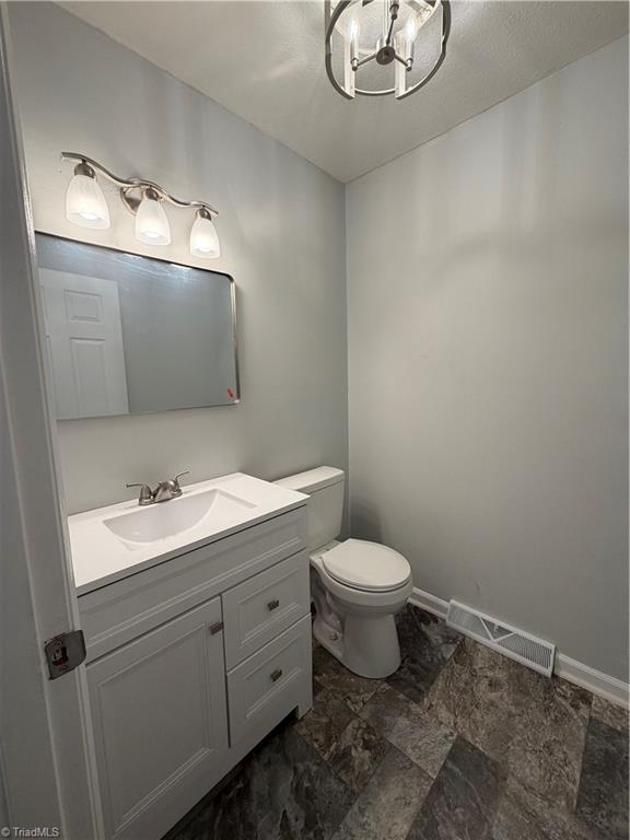 2387 Ashley Loop Reidsville, NC 27320 - Photo 9 of 21 Half bath that is beside the laundry room