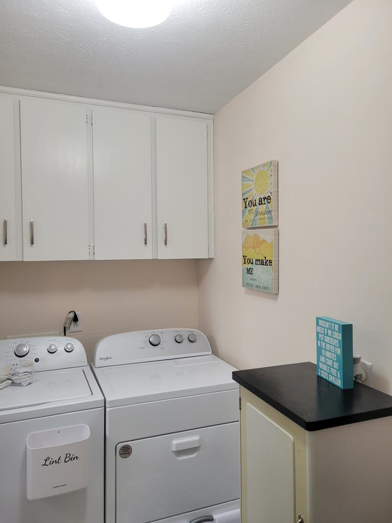 4202 Cheshire Bridge Road Columbus, GA 31909 - Photo 23 of 47 a utility room with dryer and washer