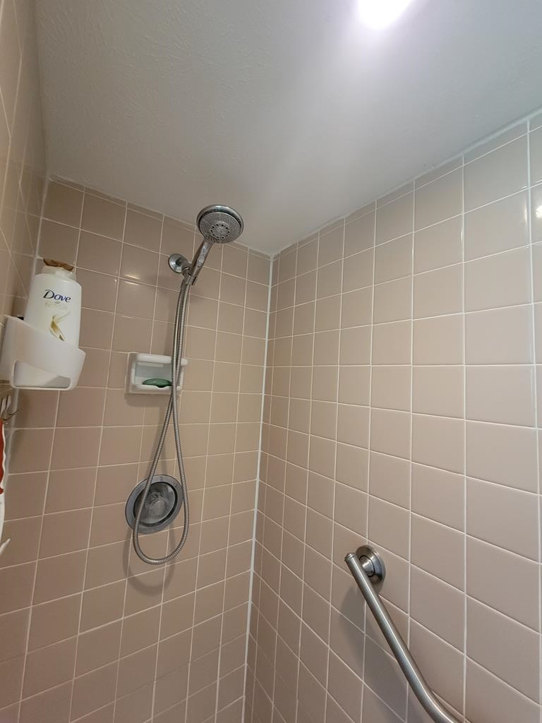 4202 Cheshire Bridge Road Columbus, GA 31909 - Photo 29 of 47 a bathroom with a shower