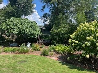 4202 Cheshire Bridge Road Columbus, GA 31909 - Photo 31 of 47 a view of a garden with a tree