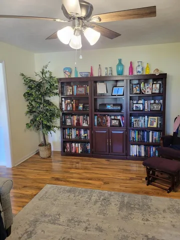 a view of a livingroom with furniture and entryway